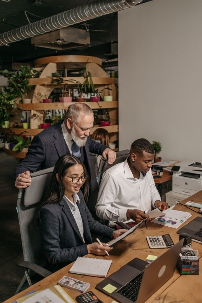 How to Give Feedback Your Team Actually Listens To A manager talking with two team members
