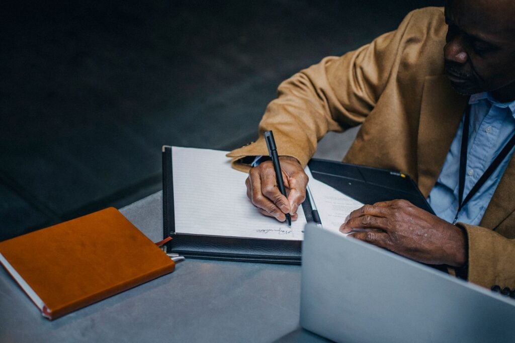 Writing notes at a desk